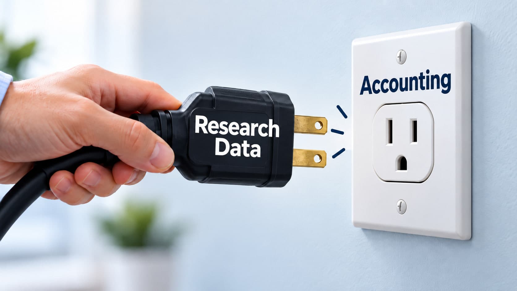 A hand holds a black electrical plug labelled Research Data toward a wall socket whose faceplate reads Accounting.